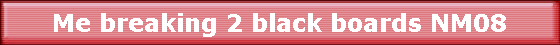 Me breaking 2 black boards NM08