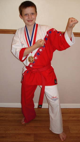 Sam Lapthorn posing with his medal.